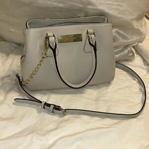 Gray Steve Madden purse with strap
